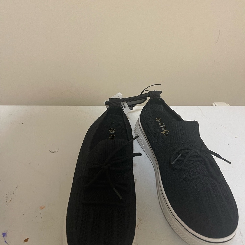Black & white size 8.5 never worn sneakers